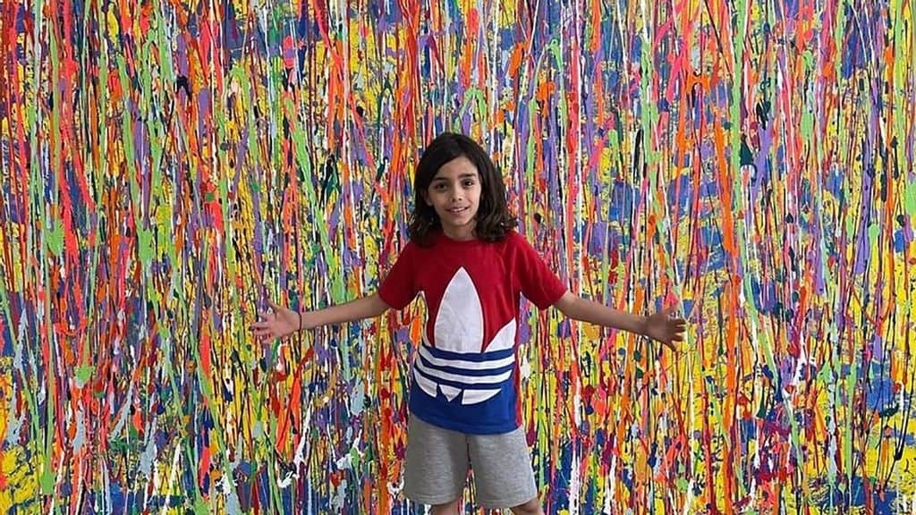 The biggest painting Mikail Akar, 9, from Cologne, Germany, abstract artist, has done so far, 200 by 300 centimetres. (@mikails_galerie/Zenger)