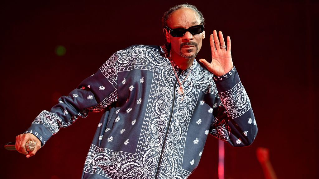 Snoop Dogg of hip-hop supergroup Mt. Westmore performs at Rupp Arena on November 20, 2021, in Lexington, Kentucky. Hestrong /strongwill be the subject of a biopic from Universal Pictures, which may finally answer his popular song title: “Who Am I?” STEPHEN J. COHEN/GETTY IMAGES