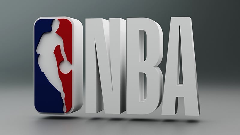 NBA logo featuring a silhouetted basketball player in red, white, and blue, symbolizing the league's iconic branding
