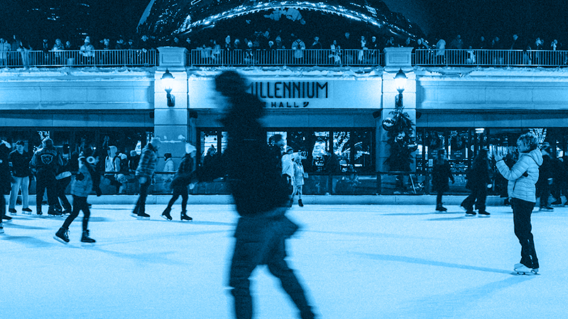 Ice skaters enjoying a festive evening at Millennium Park’s rink in Chicago, with the illuminated Millennium Hall in the background.