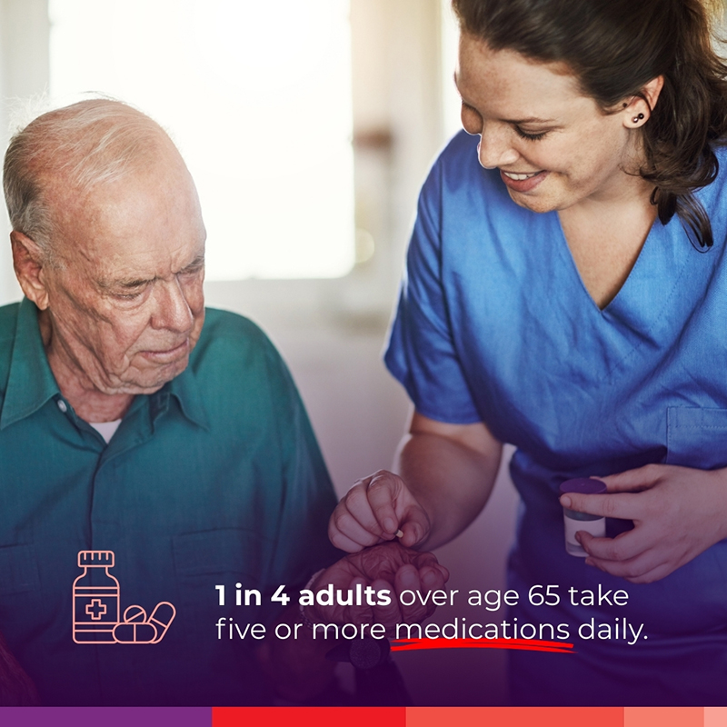 A caregiver assisting a senior with medication management at home.