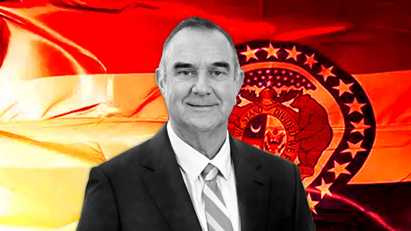 Governor of Missouri Mike Kehoe with the Great Seal of Missouri in the background, symbolizing leadership and progress in 2025.
