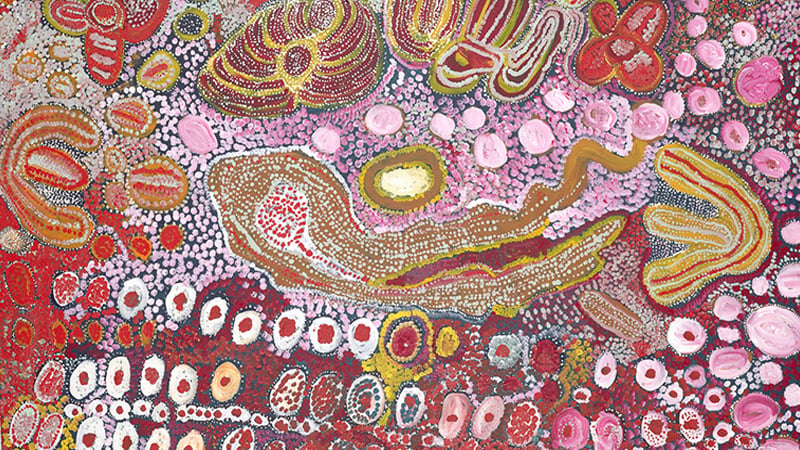 A vibrant abstract painting featuring colorful dots and organic shapes, showcasing Australian Indigenous art.