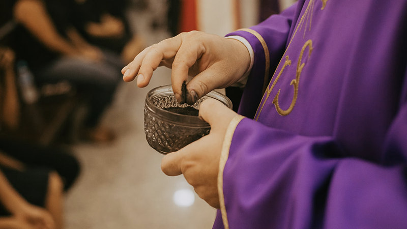 Lent season symbolized with a cross and light, representing reflection and renewal in Black Catholic churches.