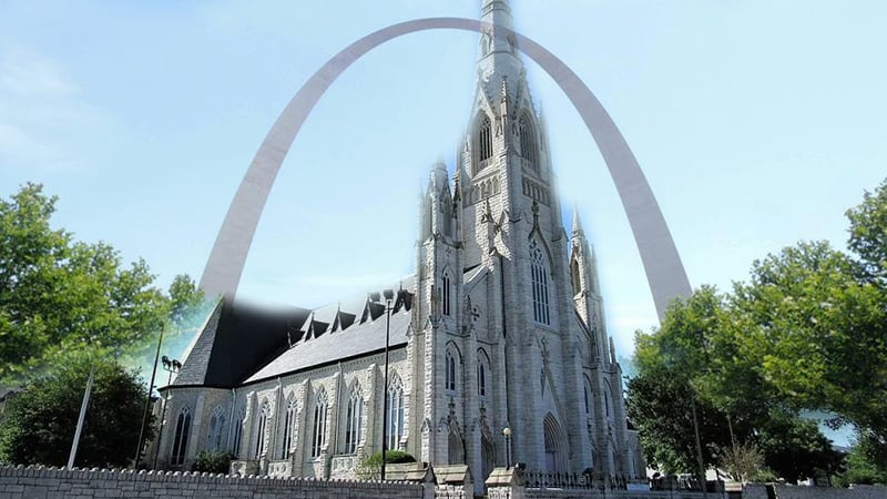 Front facade of St. Alphonsus Liguori Rock Catholic Church with Gothic architecture and intricate stone carvings.