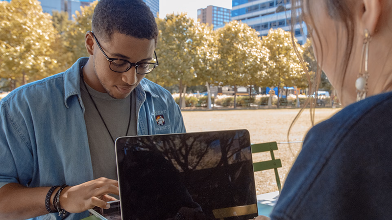 Diverse Gen Z employees collaborating in a progressive workplace that prioritizes inclusion, flexibility, and mental well-being.
