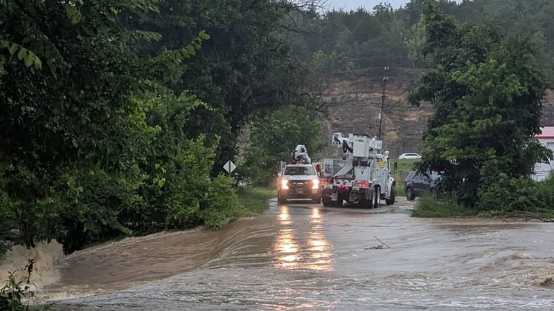High-speed emergency rescue boats navigating through Missouri natural disasters and health crises areas in the flooded Ozarks.