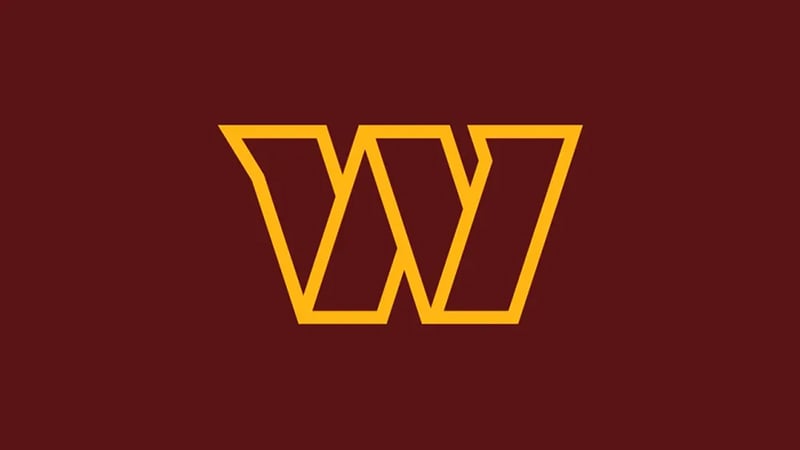 Washington Commanders logo featuring a golden yellow stylized 'W' on a dark reddish-brown background.