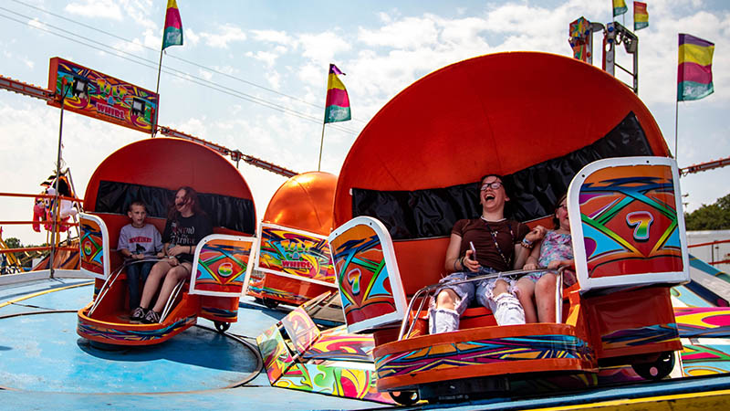 Things To Do In Detroit: Riot on the Riverfront, Mud on the Tracks: How to Tackle Charlie Wilson Live, the Ionia Free Fair, and Sterlingfest This Week!