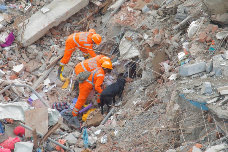 IN PHOTOS: Child Rescued 22 Hours After Deadly Building Collapse