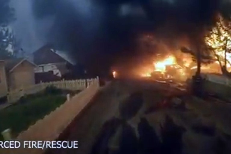 VIDEO: Firefighters Drive Through Wall of Flames to Escape Wildfire