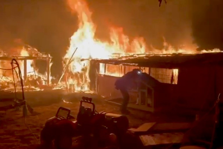 VIDEO: U.S. Firefighters Battle Blaze Threatening Trucks