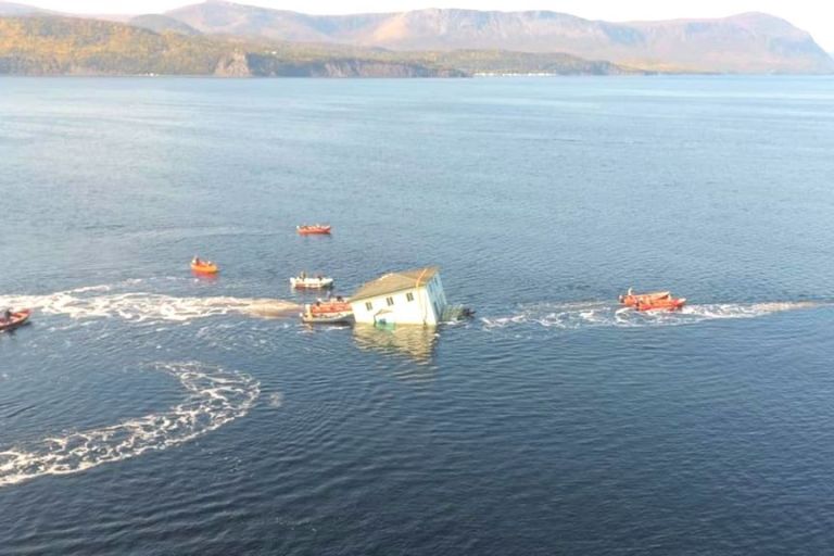 VIDEO: Flow No! How Plan To Float House Over A Bay Sprung A Leak When The Boat Broke Down