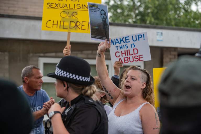 Protesters And Counter-Protesters Clash Over Library Drag Queen Hour For Kids