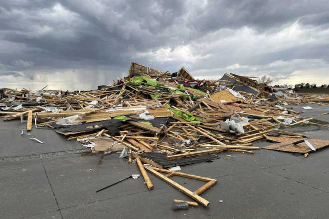 Midwest tornadoes flatten homes in Nebraska suburbs and leave trails of damage in Iowa