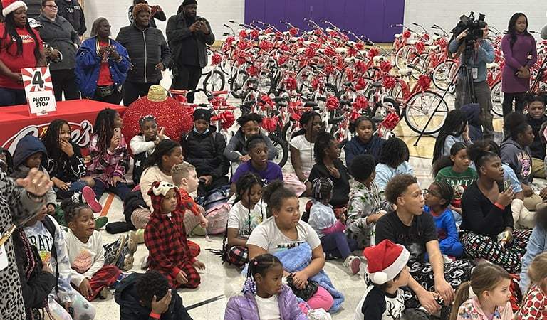 Shiny New Bikes from Raising Cane’s and Nelly Deliver Christmas Thrill to Youth at Adams Park Boys & Girls Club of Greater St. Louis. 