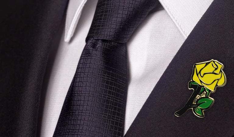 The Worldwide Origins Leaved Yellow Rose Lapel Pin: A Symbol of Pride, Tradition, and Elegance
