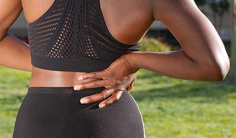 Chronic Back Pain Isn’t “Just Aging”—Here’s What It Could Really Mean