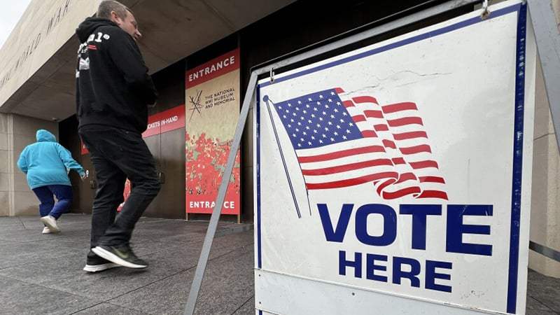 Voters casting ballots at a local polling place during an election in Missouri.
