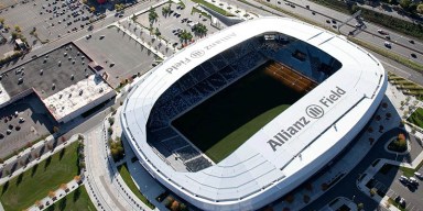 Exterior of Allianz Field lit up for soccer match during Twin Cities events week