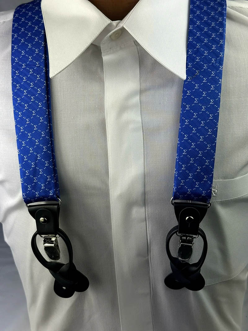 Phi Beta Sigma royal blue and white striped elastic dress suspenders with leather button tabs.
