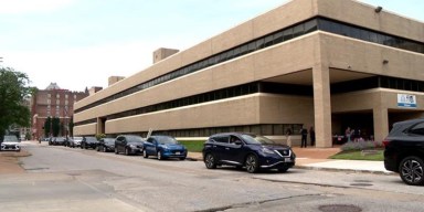 St. Louis regional news report showing the St. Louis Public Schools administrative headquarters exterior.