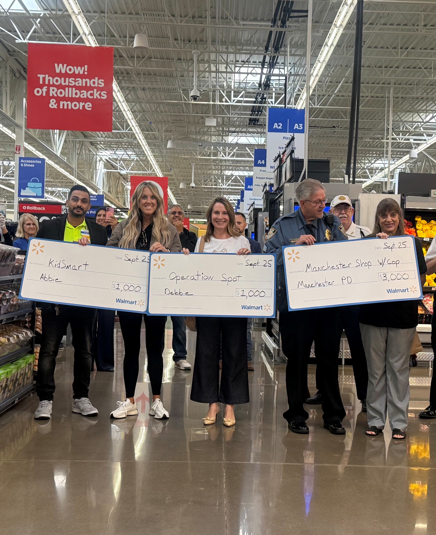 Grant Presentations To KidSmart Operation Spot And Manchester Shop With A Cop