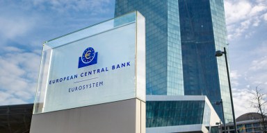 European Central Bank headquarters towering over Frankfurt financial district.