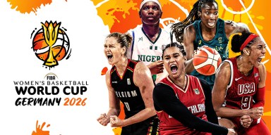 USA Women's National Basketball Team players smiling and celebrating on court during a FIBA World Cup game