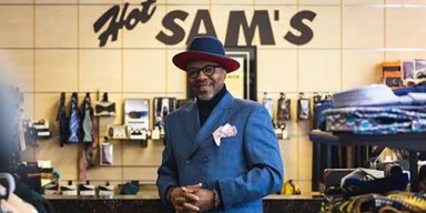 Interior of Hot Sam's menswear shop in downtown Detroit celebrating business resilience and historic retail milestones.