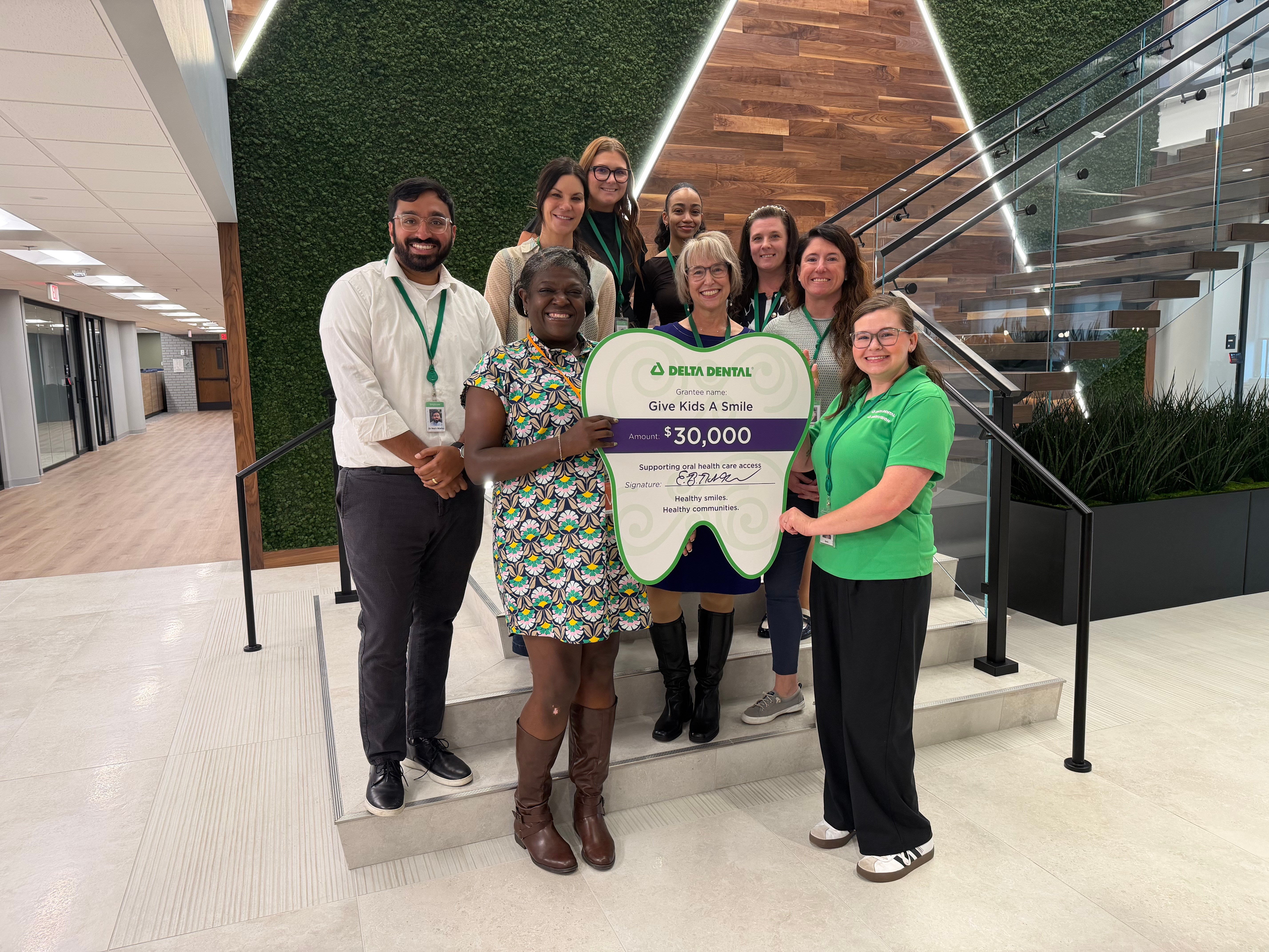 Delta Dental Presents 30000 Check To Give Kids A Smile