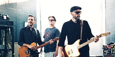 Toad the Wet Sprocket band members performing live on stage during a concert tour