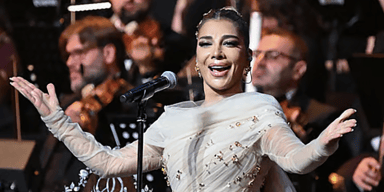 Syrian music icon Assala Nasri posing for an official tour portrait ahead of her Fox Theatre concert in Detroit