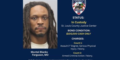 Booking mugshot of Montel Blanks wearing a dark shirt against a neutral backdrop