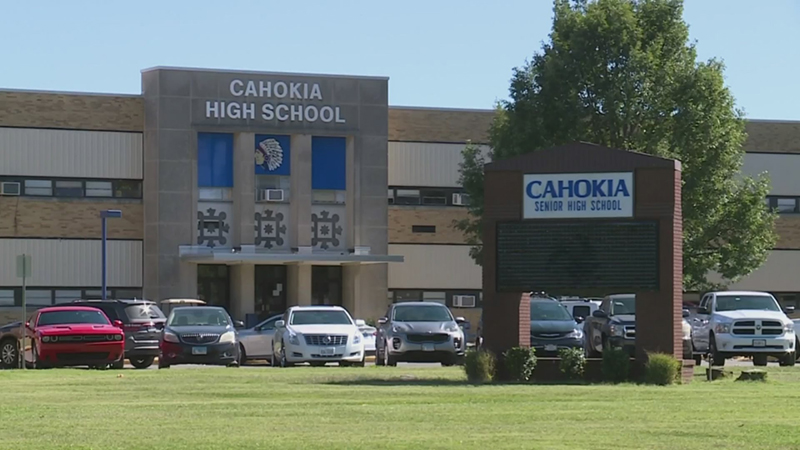 Exterior of Cahokia High School entrance and front lawn with marquee sign in Cahokia, Illinois