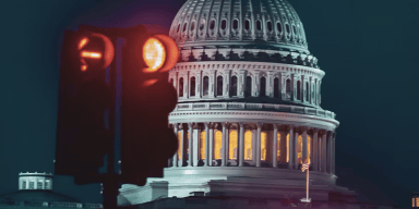 Automated speed monitoring camera operating along a Washington DC traffic corridor.