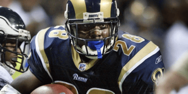 Pro Football Hall of Fame running back and Southern University coach Marshall Faulk speaking at an event