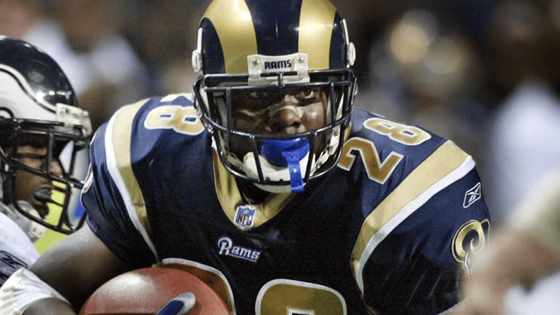 Pro Football Hall of Fame running back and Southern University coach Marshall Faulk speaking at an event