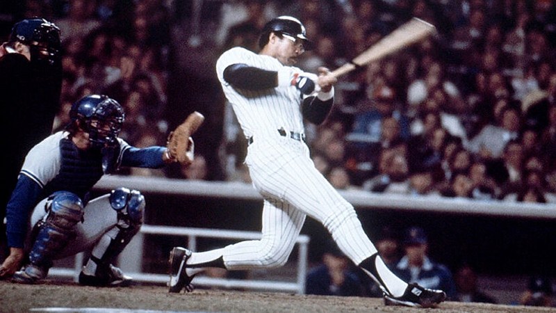 Reggie Jackson celebrating in a classic New York Yankees uniform
