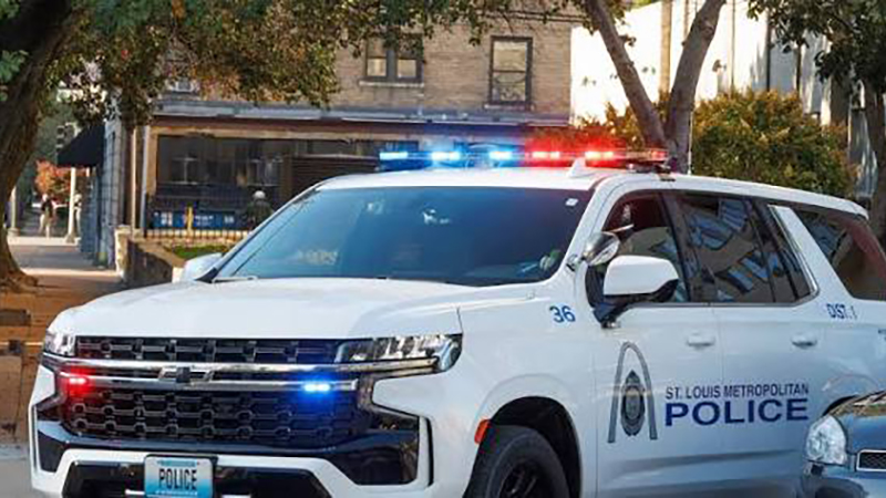 Marked St. Louis police patrol vehicle parked on city street amid reality television filming controversy